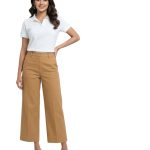 Model wearing a brown women's wide leg cropped chino